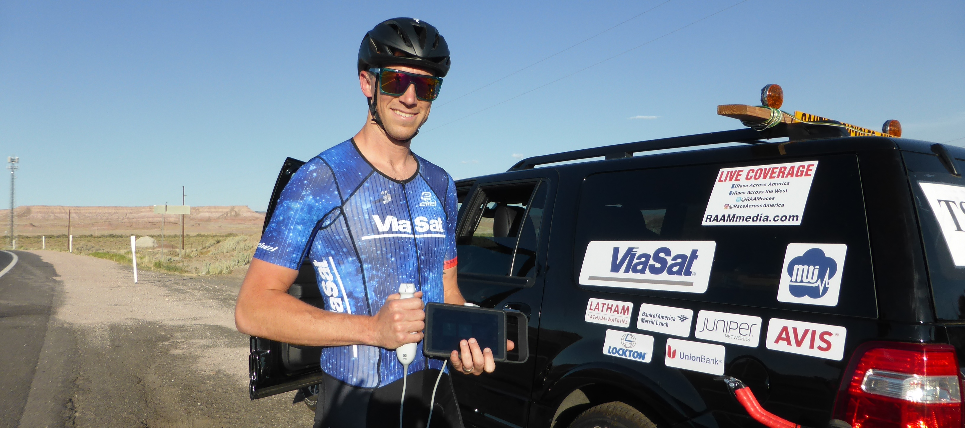 Sonosite iViz Ultrasound Machine Held by Bicyclist at Race Across America Bike Race